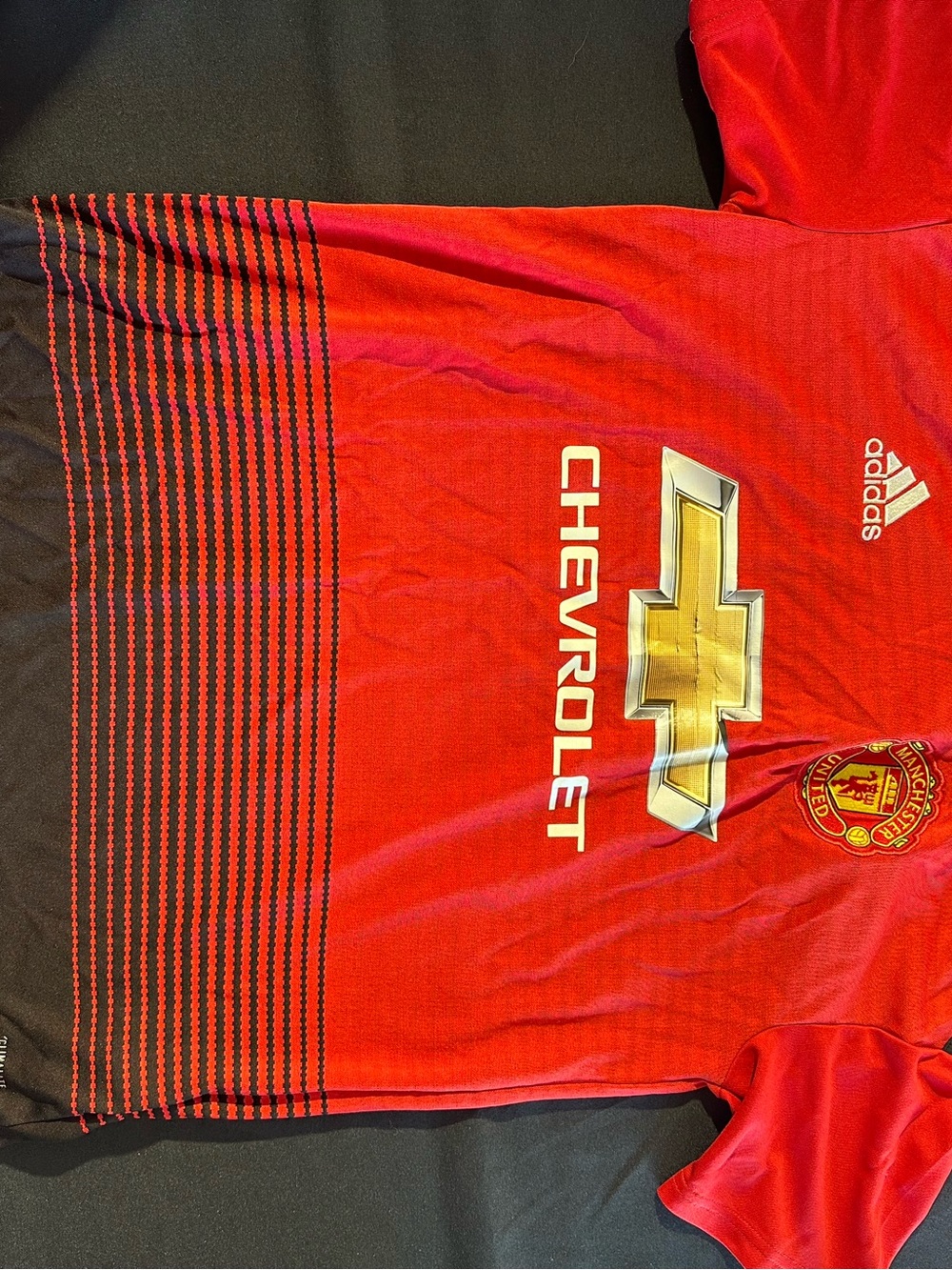 adidas Red Manchester United Home Jersey with Gold Chevrolet Logo